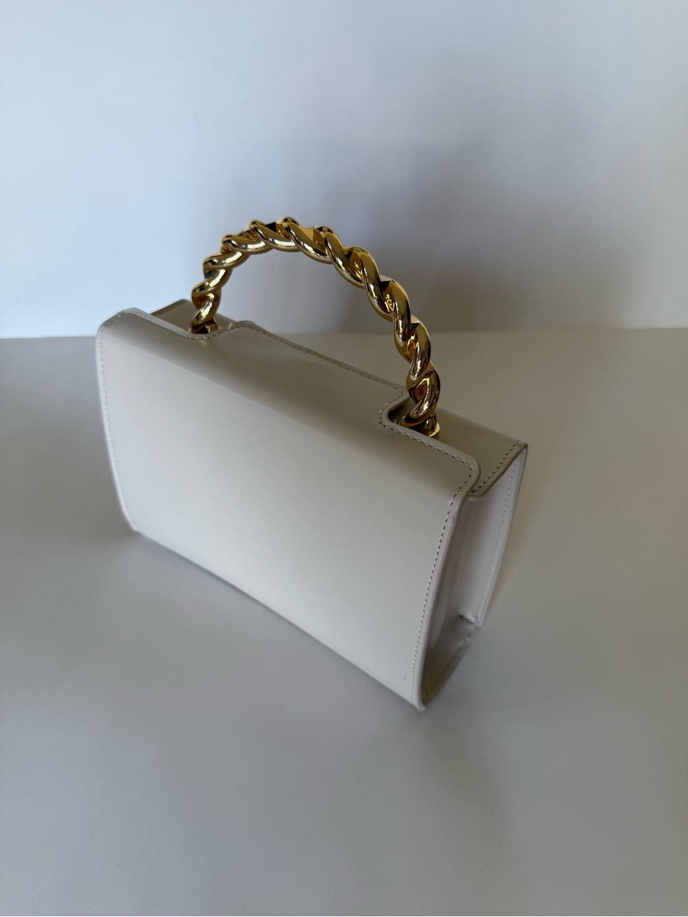 Elegant Cream Top-Handle Bag with Gold Chain
